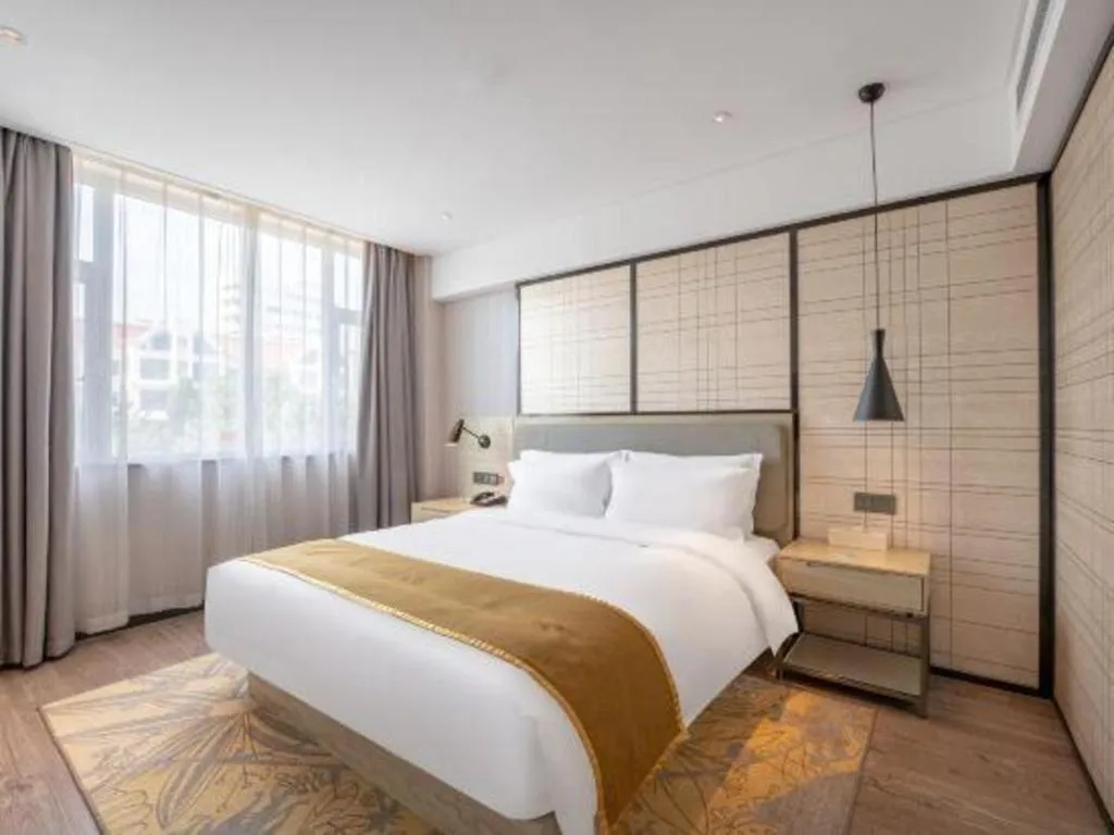 Bed in Echarm Hotel Zibo Gaoqing Zhongcheng Inernational