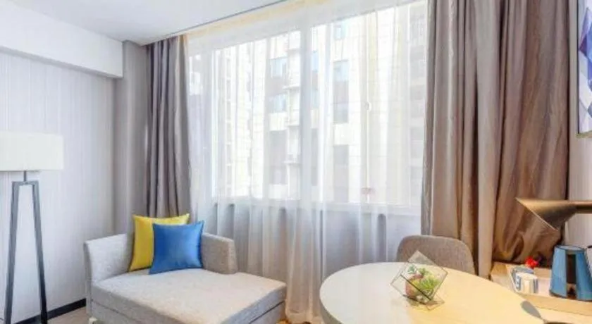 Bed in Echarm Hotel Zibo Gaoqing Zhongcheng Inernational