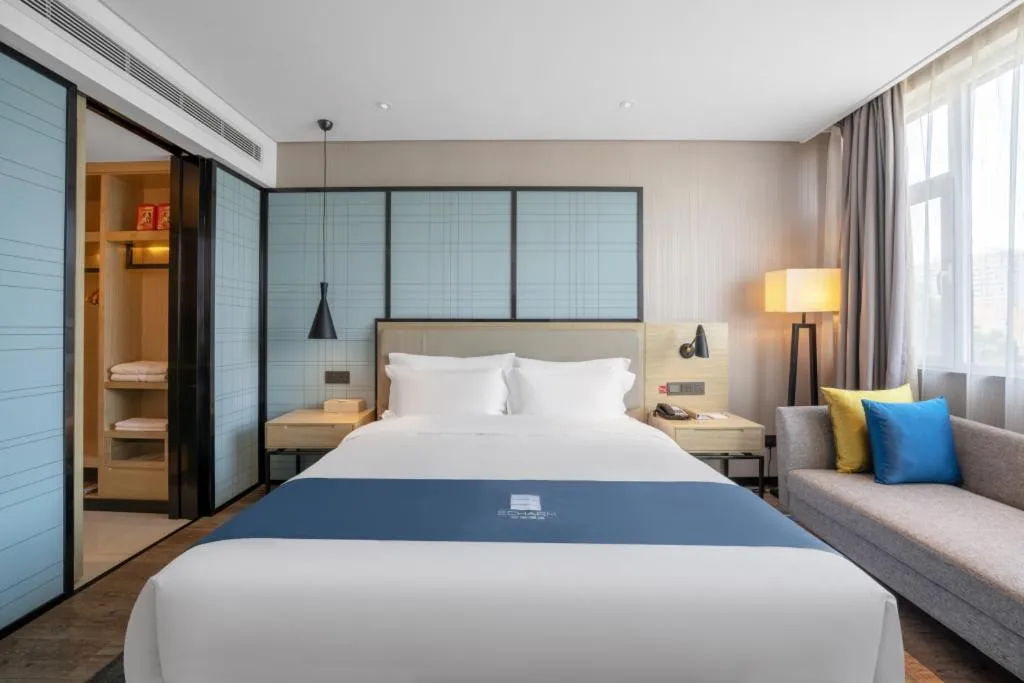 Bed in Echarm Hotel Zibo Gaoqing Zhongcheng Inernational