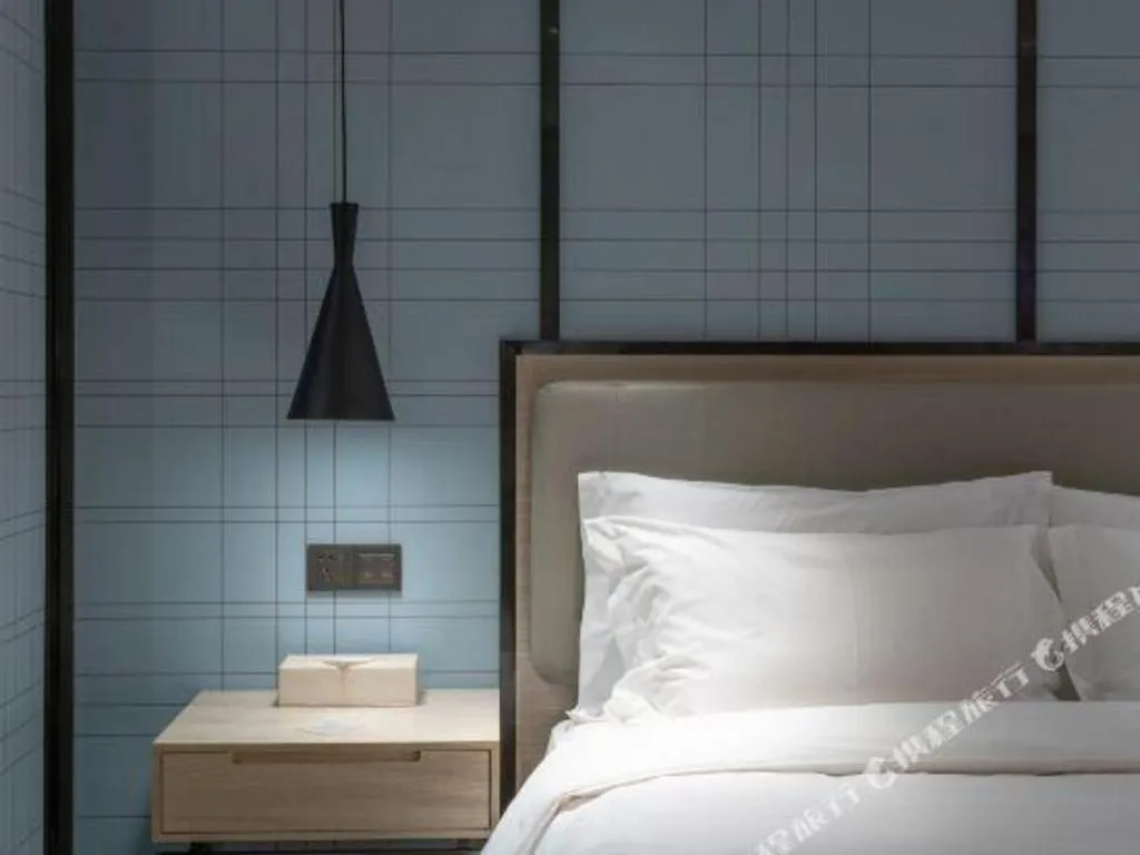 Bed in Echarm Hotel Zibo Gaoqing Zhongcheng Inernational