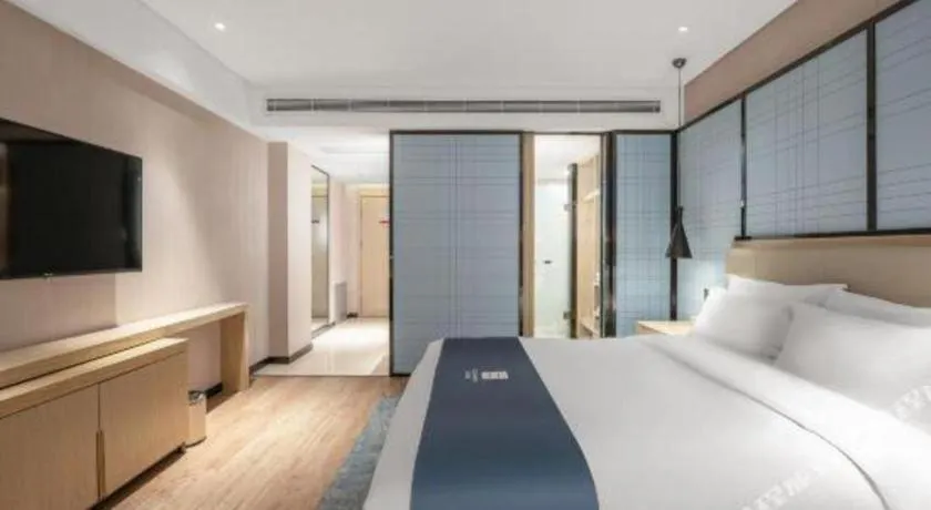 Bed in Echarm Hotel Zibo Gaoqing Zhongcheng Inernational