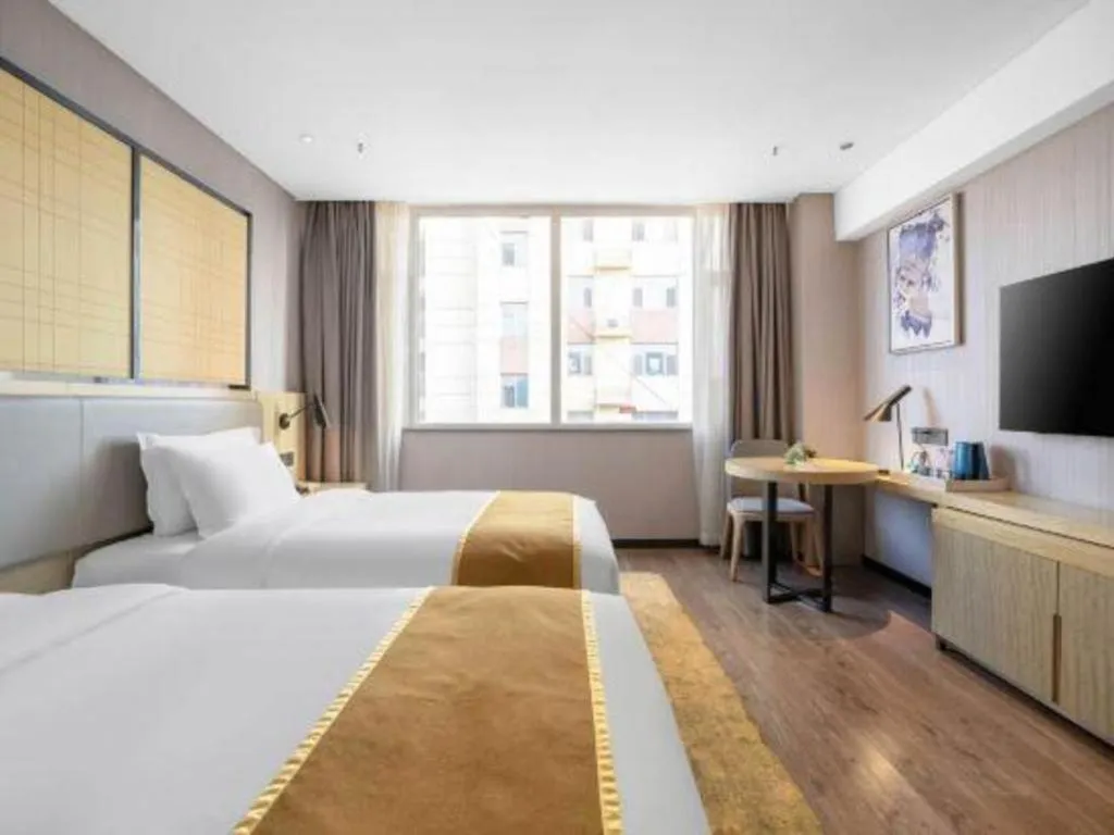 Bed in Echarm Hotel Zibo Gaoqing Zhongcheng Inernational