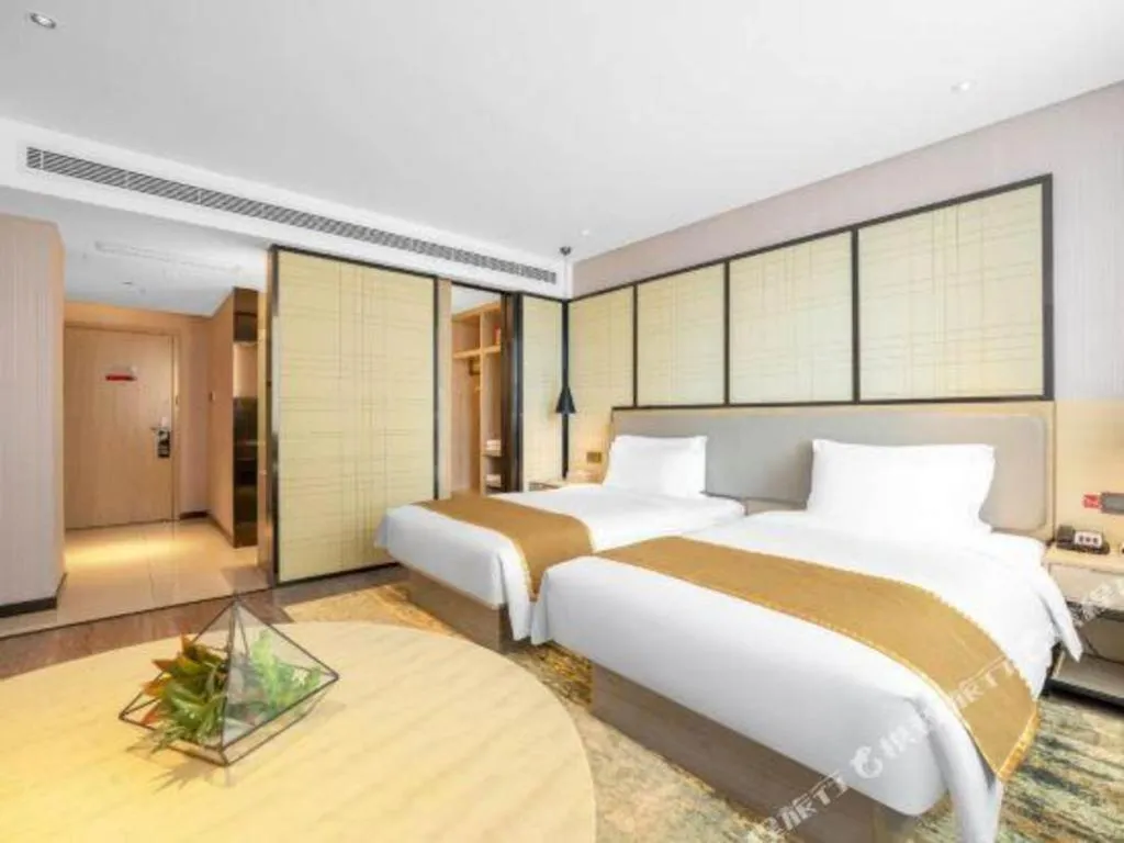 Bed in Echarm Hotel Zibo Gaoqing Zhongcheng Inernational