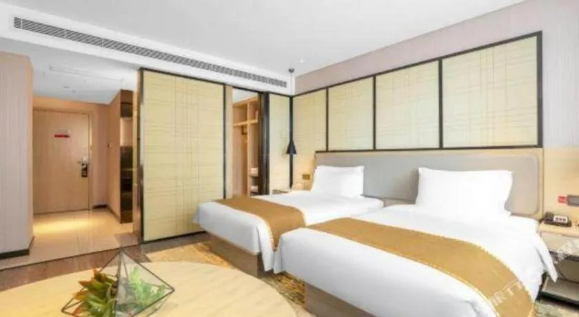 Bed in Echarm Hotel Zibo Gaoqing Zhongcheng Inernational