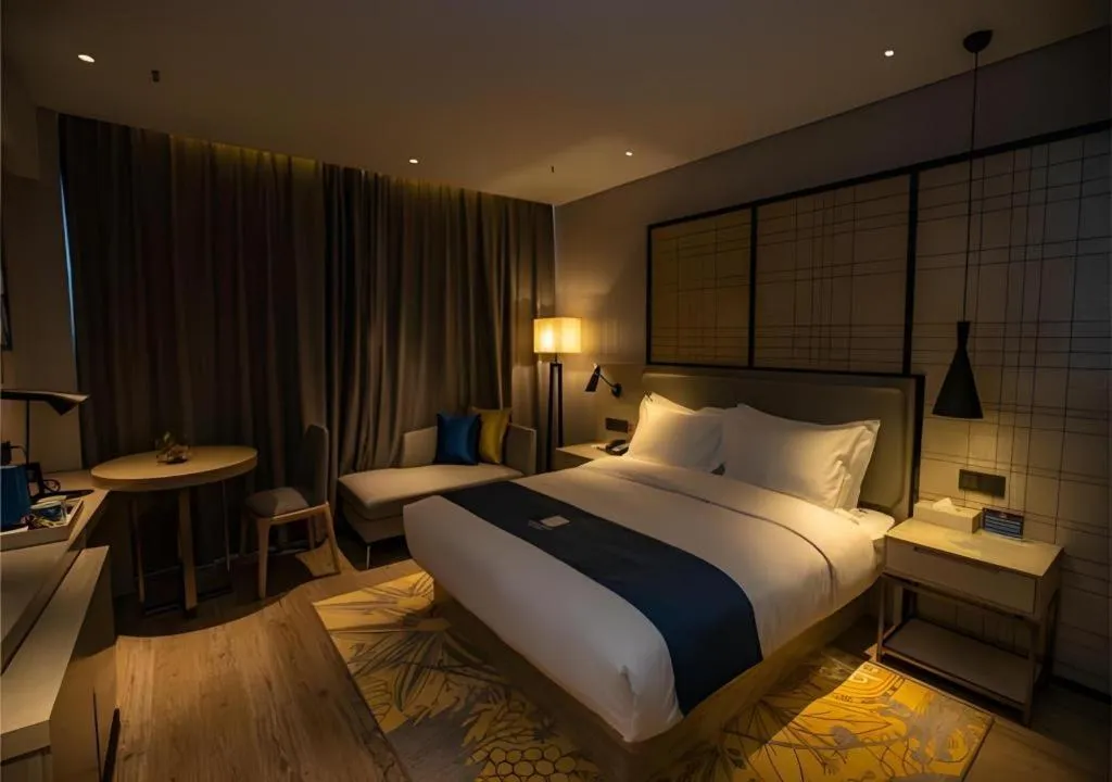 Bed in Echarm Hotel Zibo Gaoqing Zhongcheng Inernational