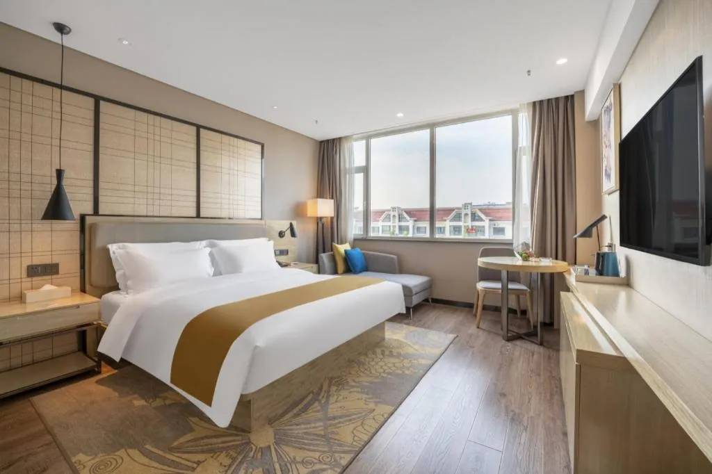 Bed in Echarm Hotel Zibo Gaoqing Zhongcheng Inernational