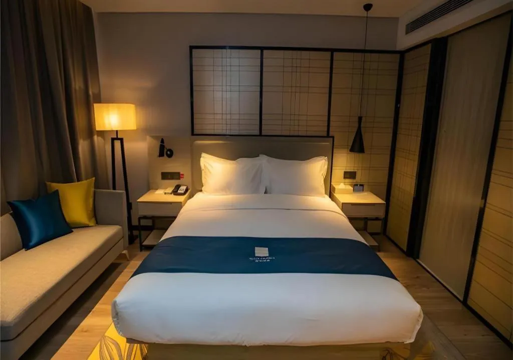 Bed in Echarm Hotel Zibo Gaoqing Zhongcheng Inernational