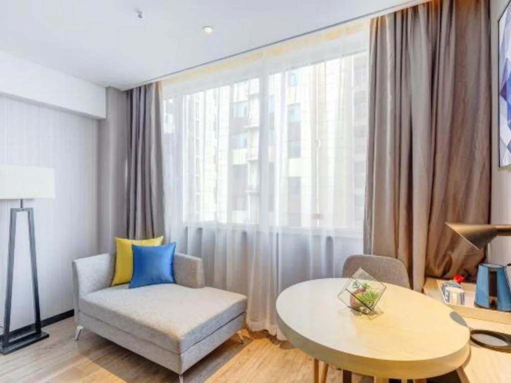 Bed in Echarm Hotel Zibo Gaoqing Zhongcheng Inernational