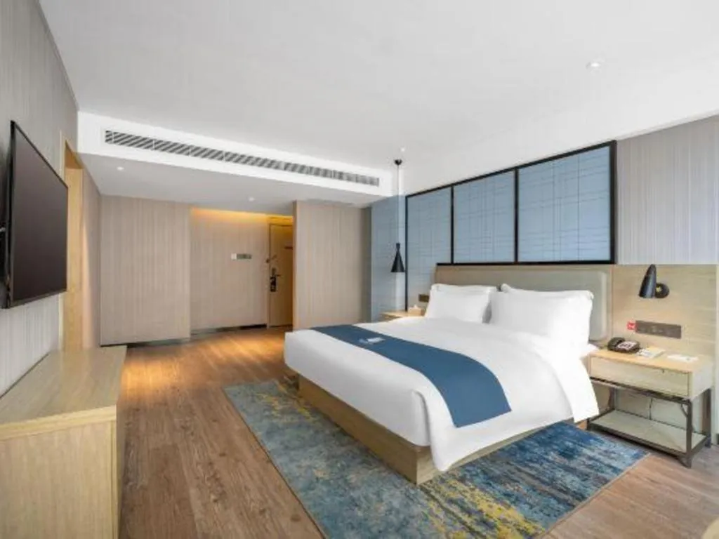 Bed in Echarm Hotel Zibo Gaoqing Zhongcheng Inernational
