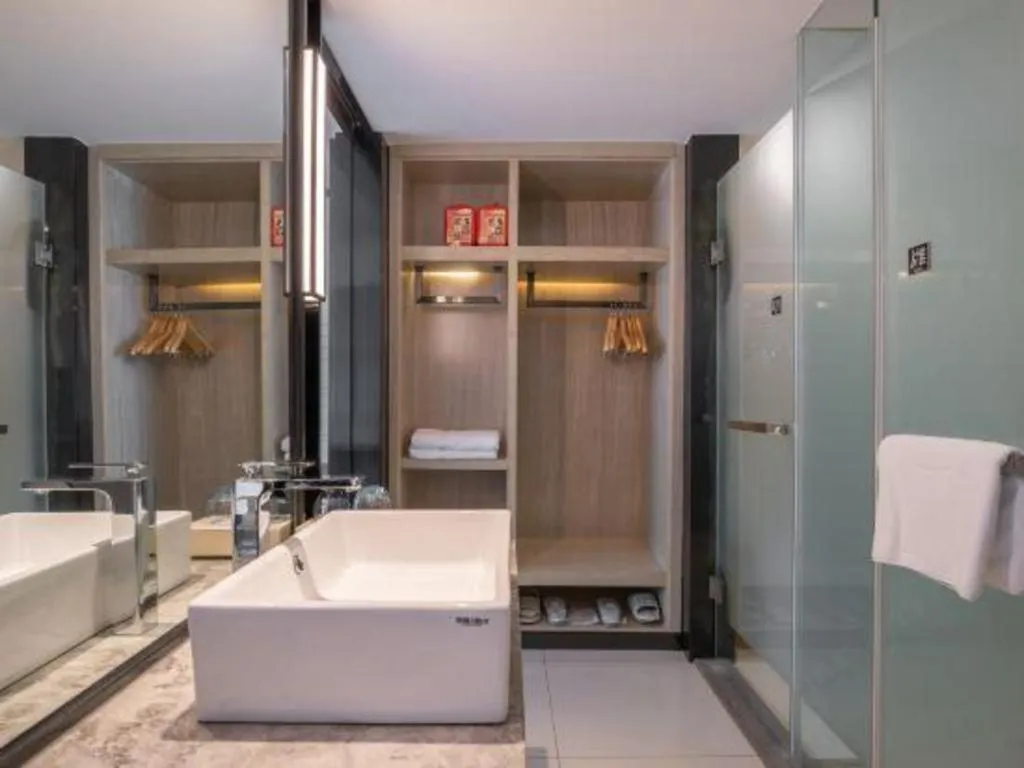 Bed in Echarm Hotel Zibo Gaoqing Zhongcheng Inernational