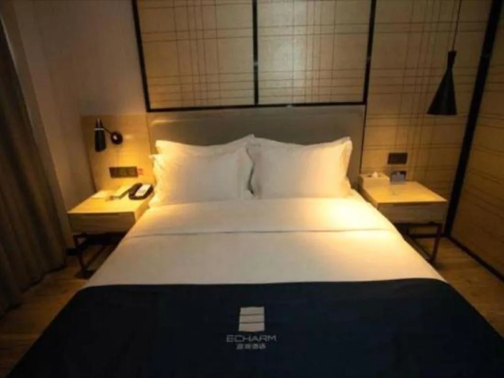 Bed in Echarm Hotel Zibo Gaoqing Zhongcheng Inernational