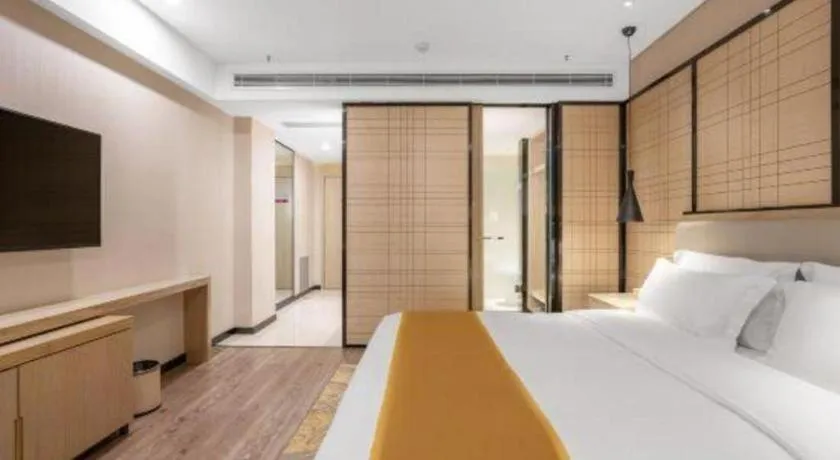 Bed in Echarm Hotel Zibo Gaoqing Zhongcheng Inernational