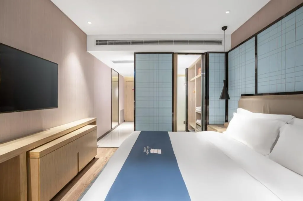 Bed in Echarm Hotel Zibo Gaoqing Zhongcheng Inernational
