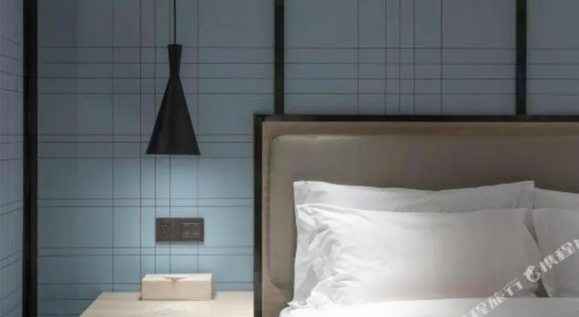 Bed in Echarm Hotel Zibo Gaoqing Zhongcheng Inernational