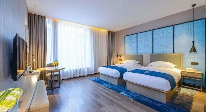Bed in Echarm Hotel Kunming Railway Station Huancheng South Road Metro Station Bed in Echarm Hotel Kunming Railway Station Huancheng South Road Metro Station