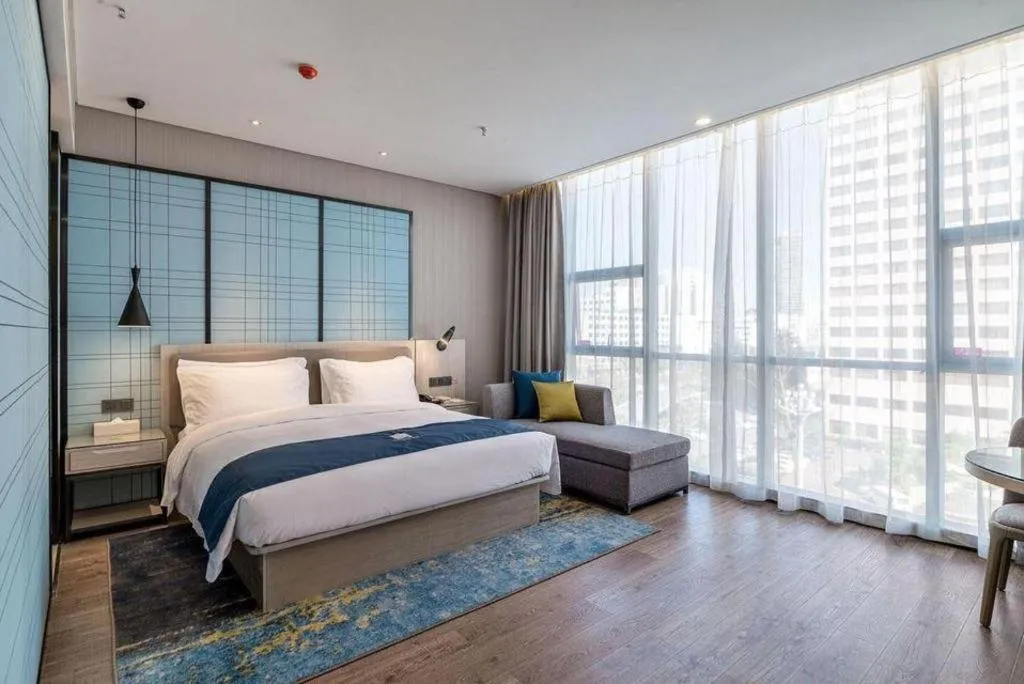 Bed in Echarm Hotel Kunming Railway Station Huancheng South Road Metro Station