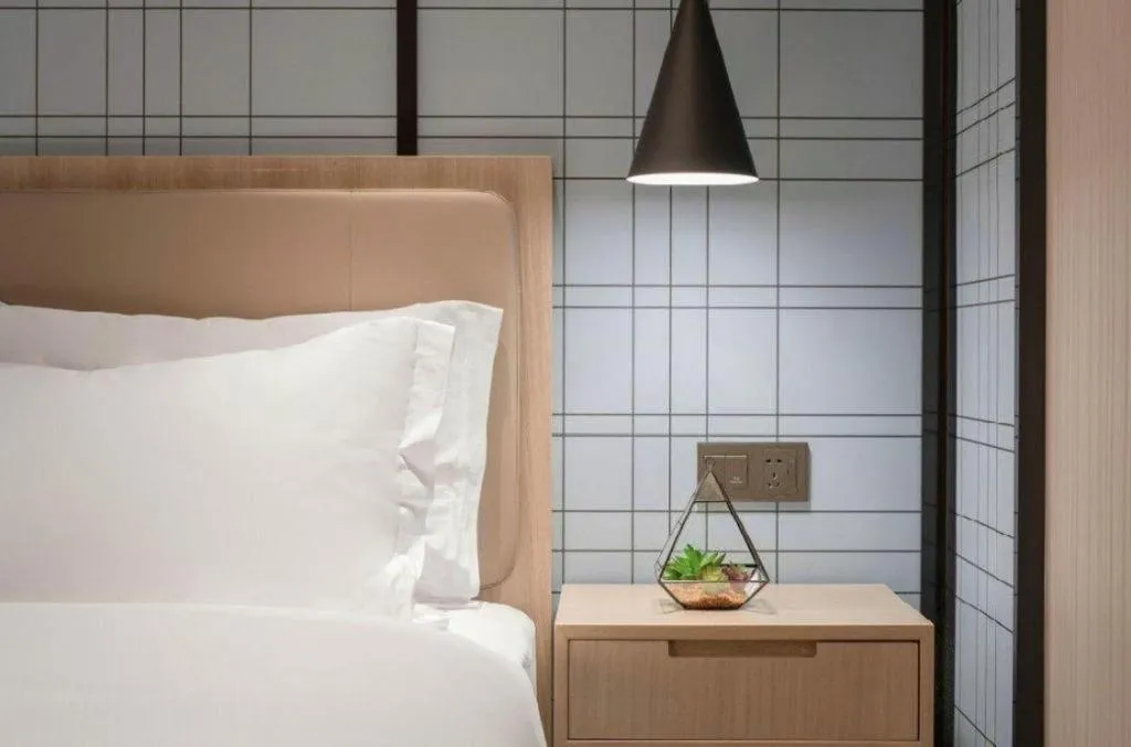 Bed in Echarm Hotel Kunming Railway Station Huancheng South Road Metro Station