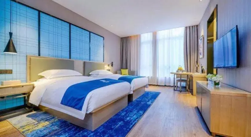 Bed in Echarm Hotel Kunming Railway Station Huancheng South Road Metro Station Bed in Echarm Hotel Kunming Railway Station Huancheng South Road Metro Station