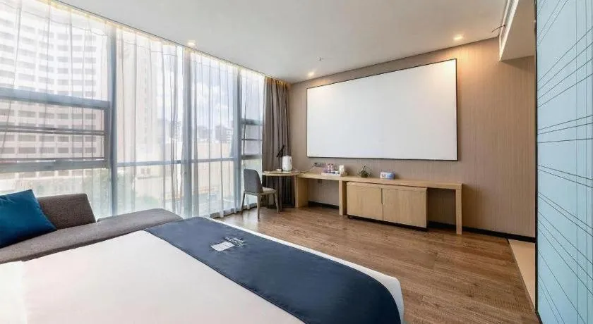 Bed in Echarm Hotel Kunming Railway Station Huancheng South Road Metro Station