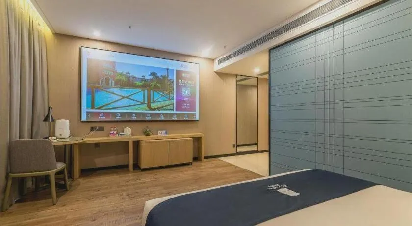 Bed in Echarm Hotel Kunming Railway Station Huancheng South Road Metro Station