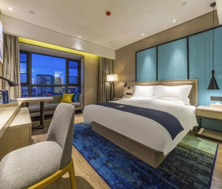 Bed in Echarm Hotel Kunming Railway Station Huancheng South Road Metro Station