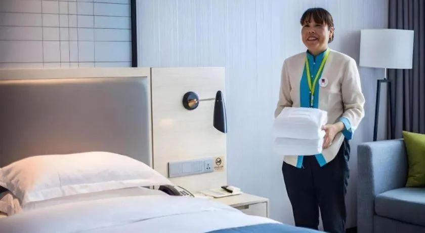 Bed in Echarm Hotel Kunming Railway Station Huancheng South Road Metro Station