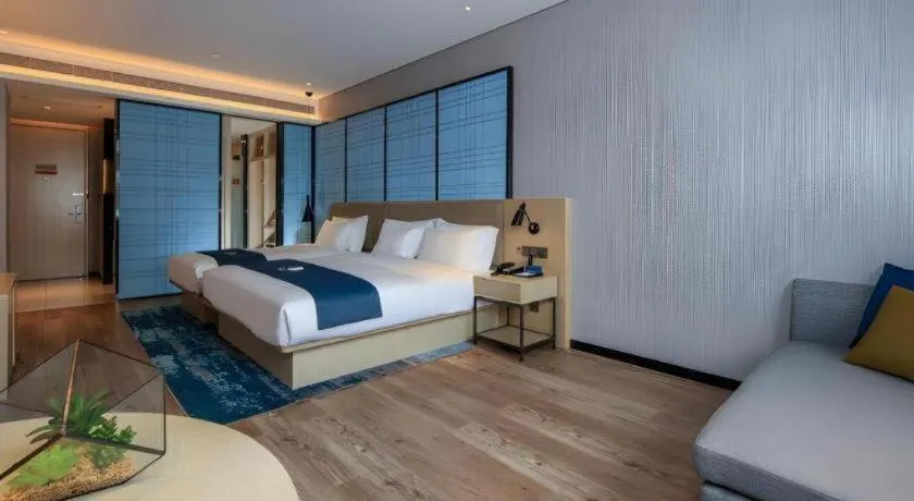 Bed in Echarm Hotel Kunming Railway Station Huancheng South Road Metro Station