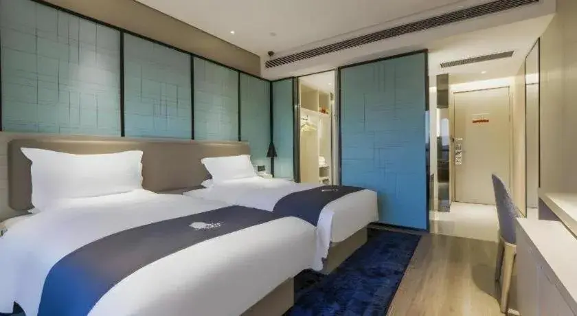 Bed in Echarm Hotel Kunming Railway Station Huancheng South Road Metro Station Bed in Echarm Hotel Kunming Railway Station Huancheng South Road Metro Station