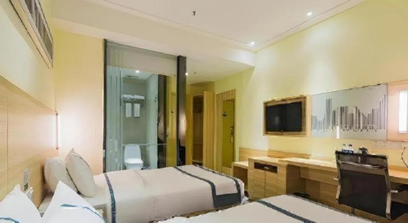 Bed in City Comfort Inn Guangzhou Tianhetang Xiajunjing Garden