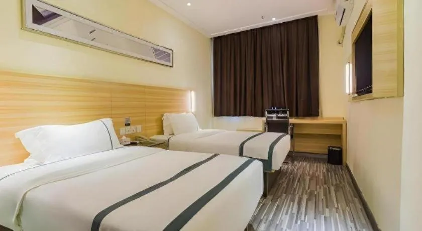Bed in City Comfort Inn Guangzhou Tianhetang Xiajunjing Garden