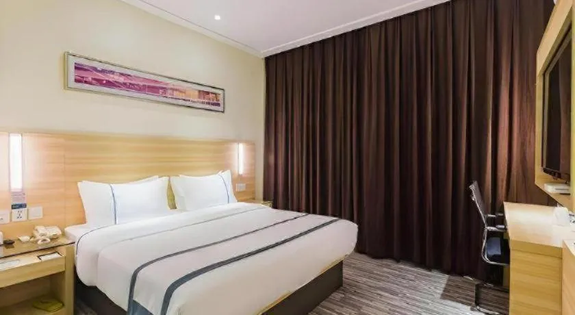 Bed in City Comfort Inn Guangzhou Tianhetang Xiajunjing Garden