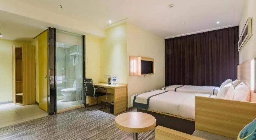 Bed in City Comfort Inn Guangzhou Tianhetang Xiajunjing Garden