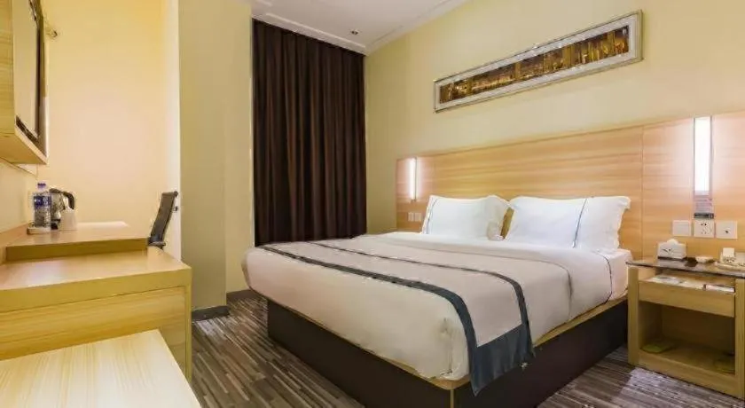 Bed in City Comfort Inn Guangzhou Tianhetang Xiajunjing Garden