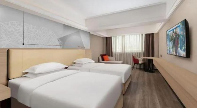 Bed in Borrman Hotel Guangzhou Railway Station Sanyuanli Metro Station