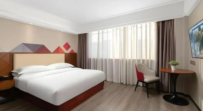 Bed in Borrman Hotel Guangzhou Railway Station Sanyuanli Metro Station Bed in Borrman Hotel Guangzhou Railway Station Sanyuanli Metro Station