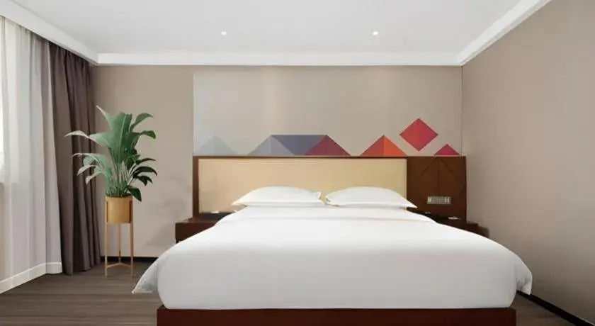 Bed in Borrman Hotel Guangzhou Railway Station Sanyuanli Metro Station Bed in Borrman Hotel Guangzhou Railway Station Sanyuanli Metro Station