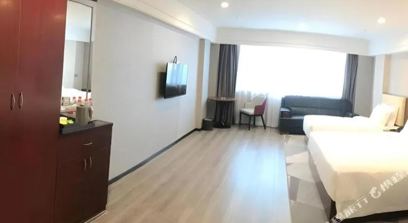 Bed in Borrman Hotel Guangzhou Railway Station Sanyuanli Metro Station