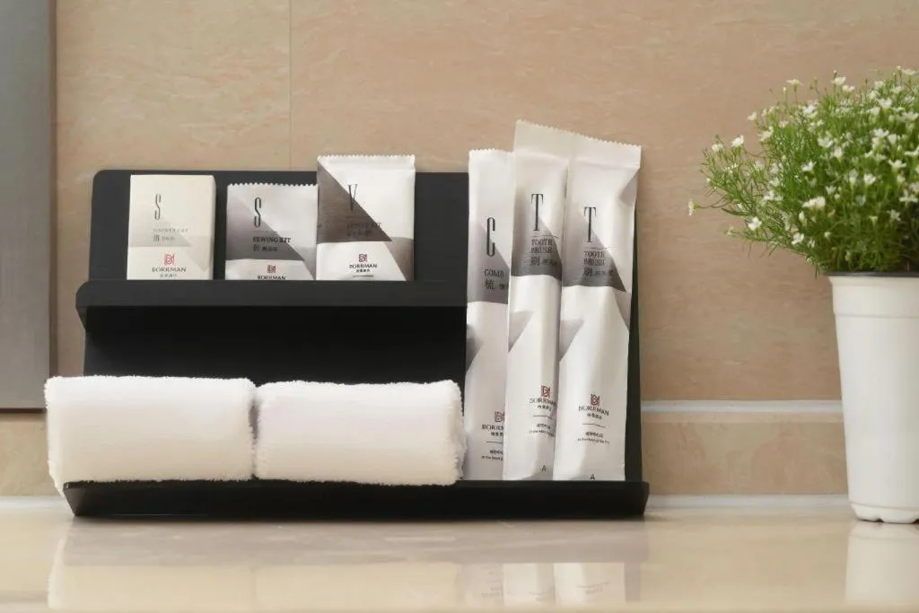 Bed in Borrman Hotel Guangzhou Railway Station Sanyuanli Metro Station