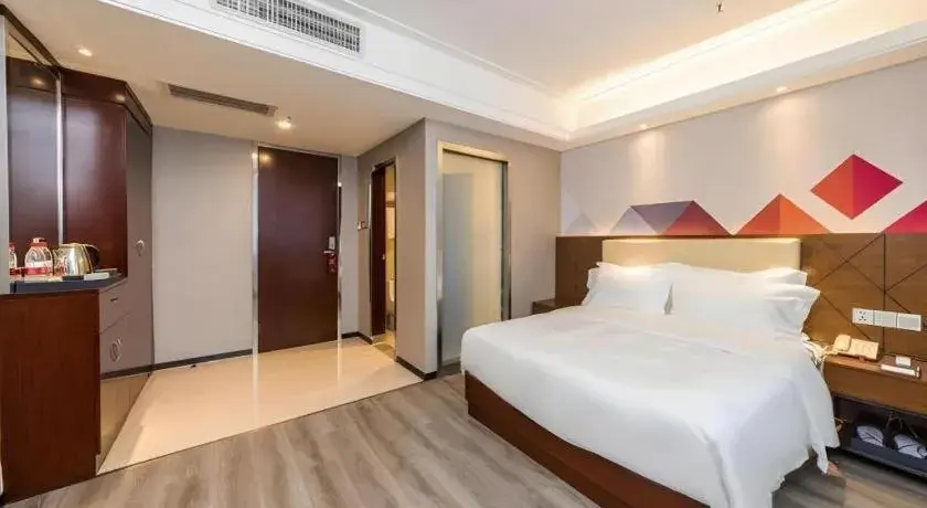 Bed in Borrman Hotel Guangzhou Railway Station Sanyuanli Metro Station Bed in Borrman Hotel Guangzhou Railway Station Sanyuanli Metro Station