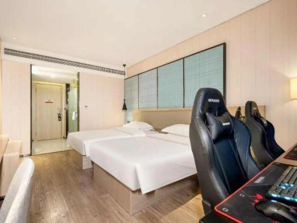 Bed in Echarm Hotel Nanning the MixC Exhibition Center Metro Station