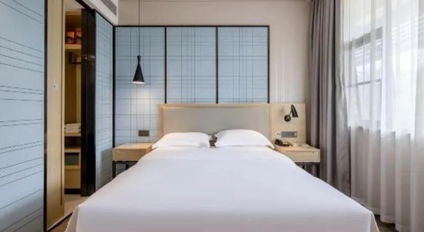 Bed in Echarm Hotel Nanning the MixC Exhibition Center Metro Station
