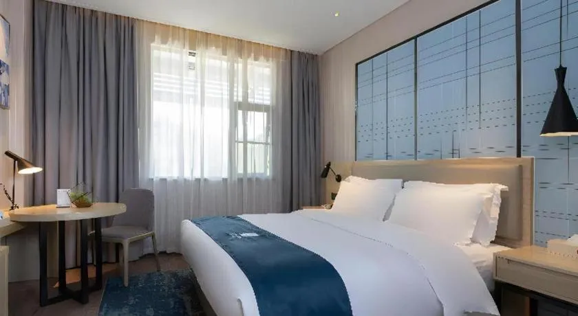 Bed in Echarm Hotel Nanning the MixC Exhibition Center Metro Station