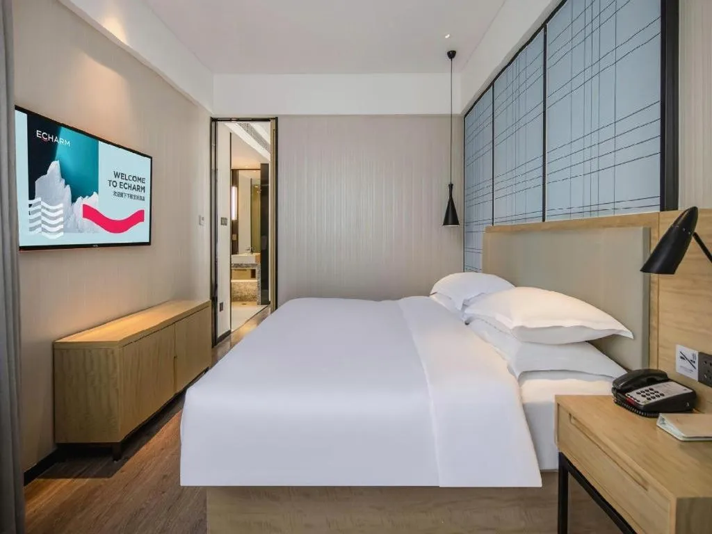 Bed in Echarm Hotel Nanning the MixC Exhibition Center Metro Station