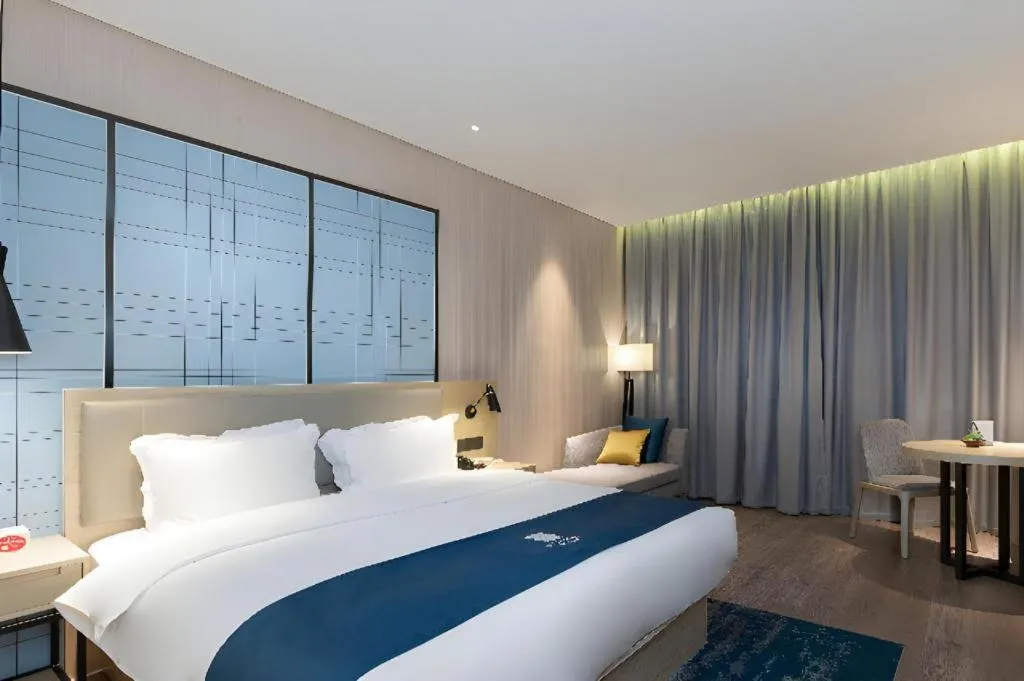 Bed in Echarm Hotel Nanning the MixC Exhibition Center Metro Station