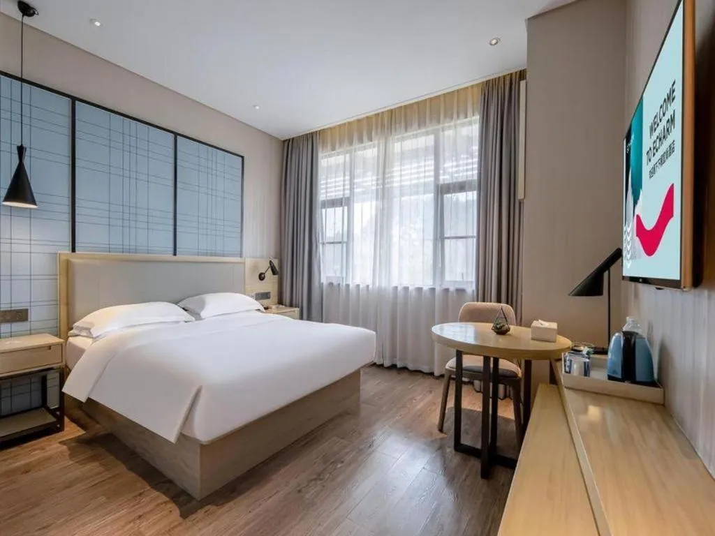 Bed in Echarm Hotel Nanning the MixC Exhibition Center Metro Station