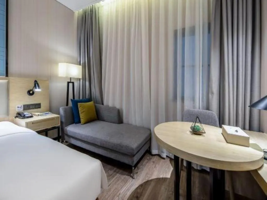 Bed in Echarm Hotel Nanning the MixC Exhibition Center Metro Station