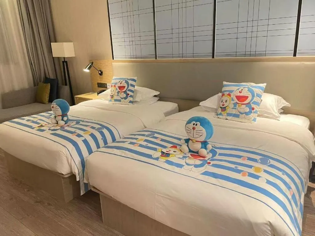 Bed in Echarm Hotel Nanning the MixC Exhibition Center Metro Station