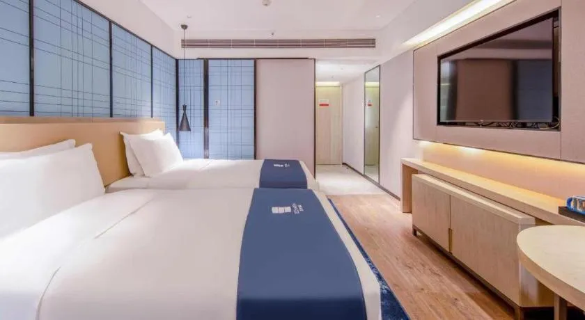 Bed in Echarm Hotel Nanning the MixC Exhibition Center Metro Station