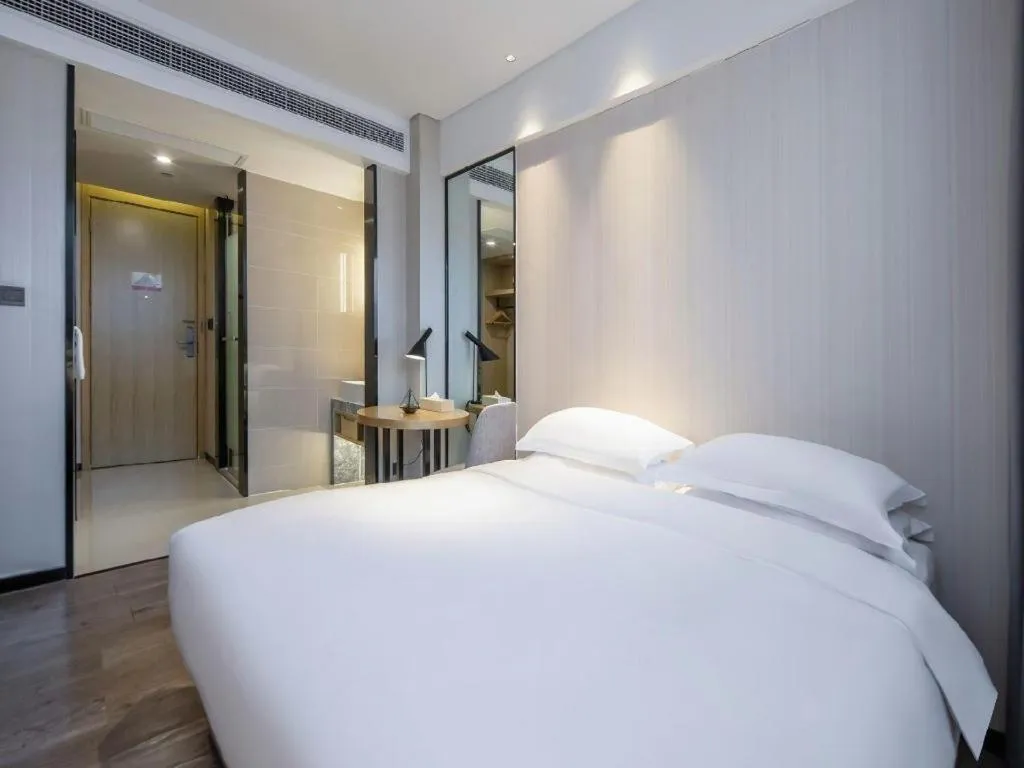 Bed in Echarm Hotel Nanning the MixC Exhibition Center Metro Station