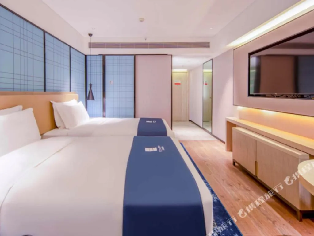 Bed in Echarm Hotel Nanning the MixC Exhibition Center Metro Station